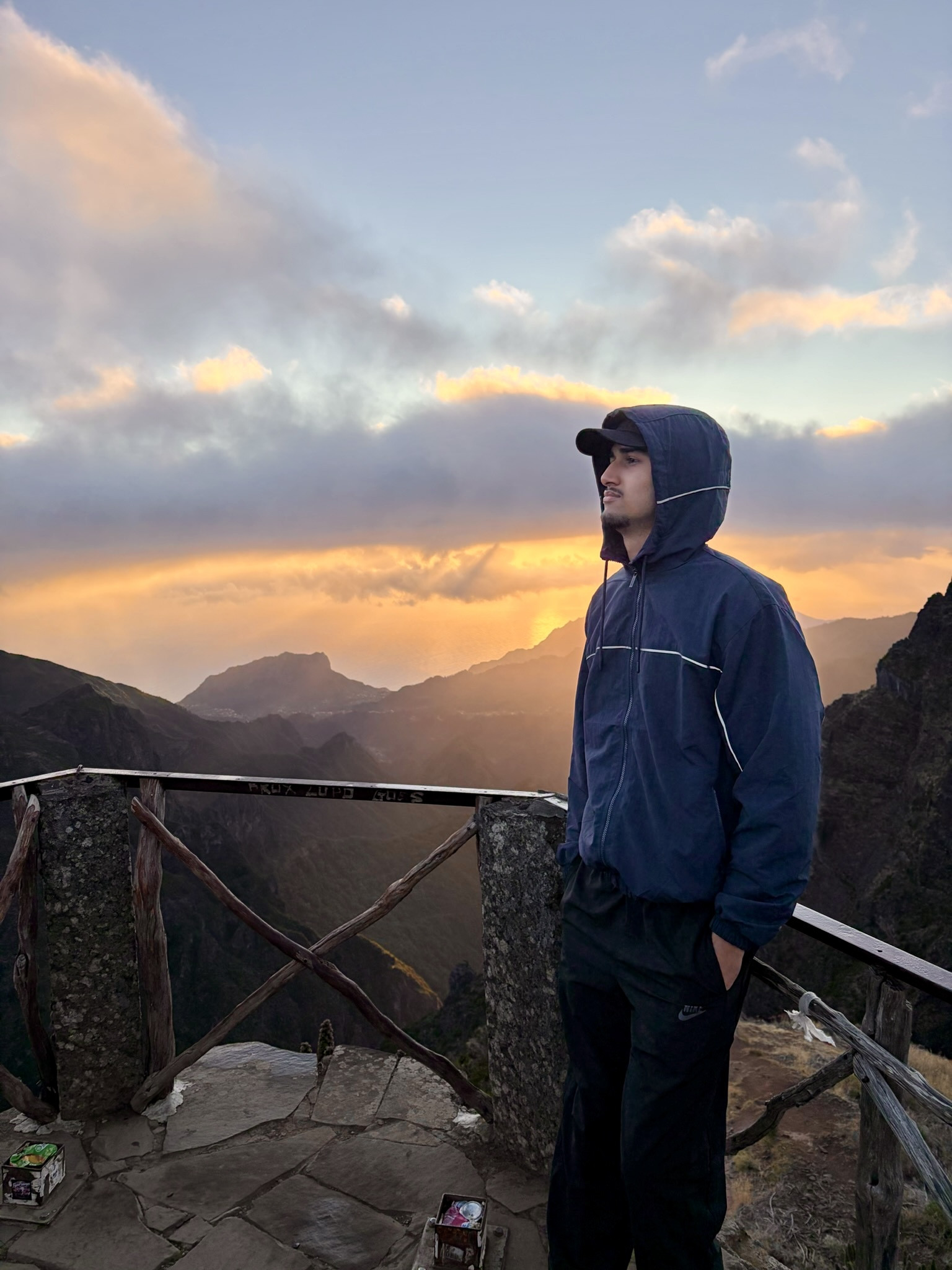 6am sunrise above the clouds on an island