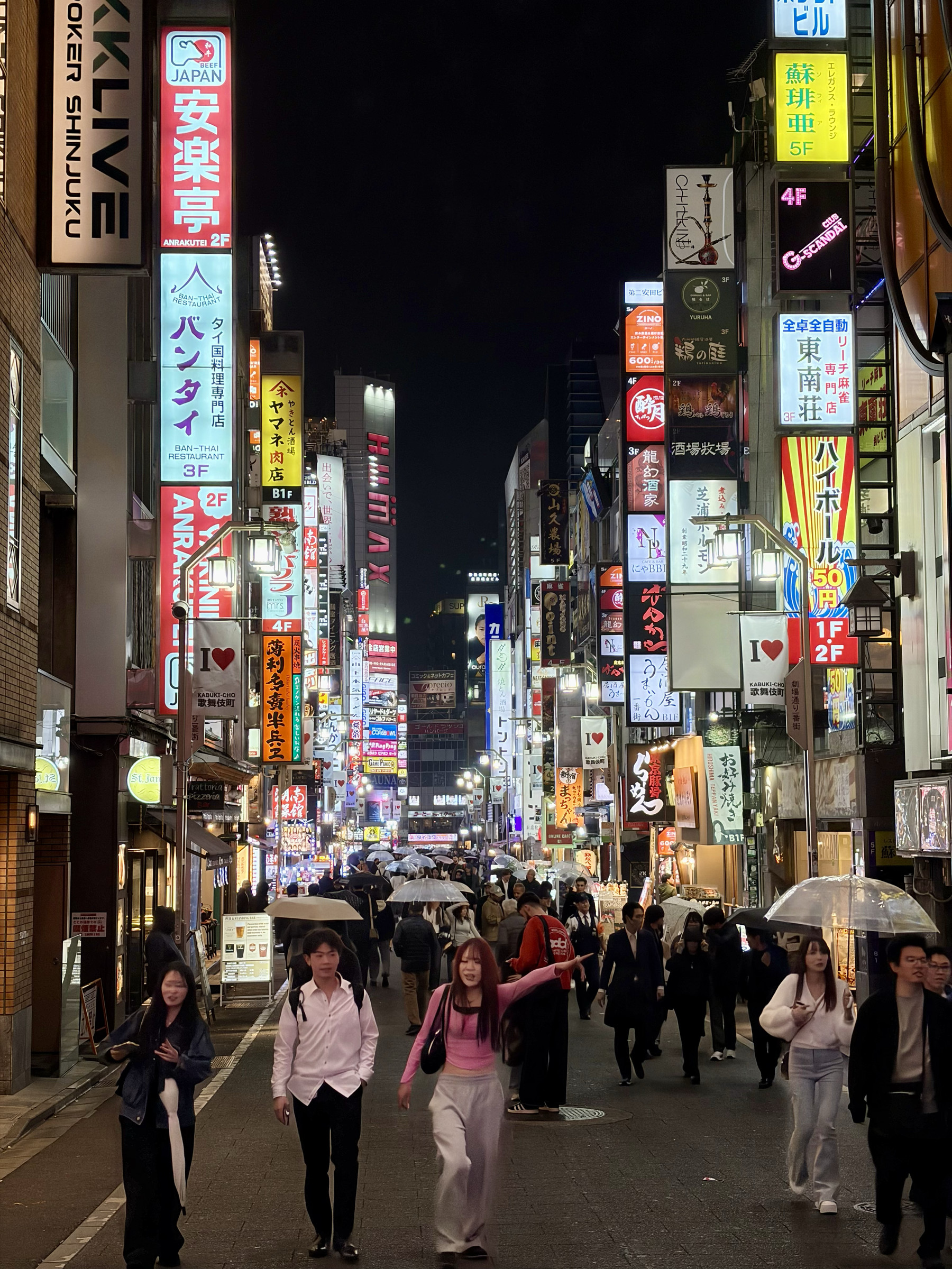 Neon signs and endless crowds